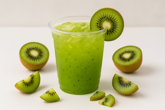 KIWI MOCKTAIL IN PLASTIC GLASS WITH KIWI PIECES AROUND IT